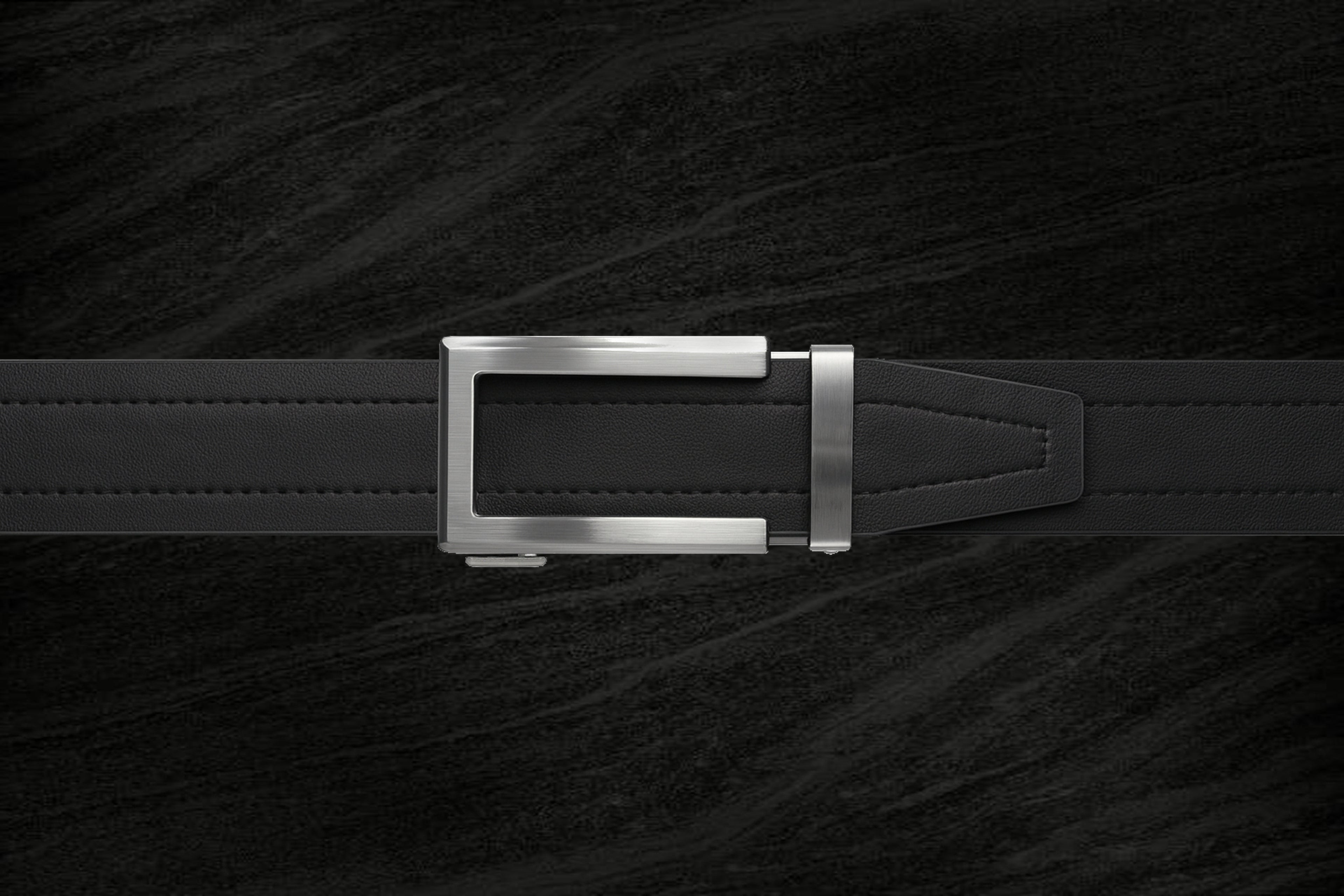 Product Riemoda Onyx automatische heren riem zwart leer met zilveren gesp - riem zonder gaatjes